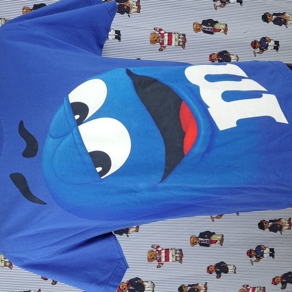 M&M'S Other - Y2K Blue Almond 2M&M candy big smiley face graphic AOP blue & white XL t-shirt